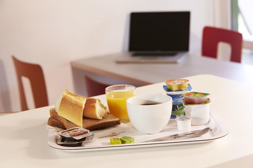 พรีมิเย คลาส ลียง ซองทร์ การ์ฺ ปาร์ตดิเยอ โฮเทล Hotel ร้านอาหาร รูปภาพ